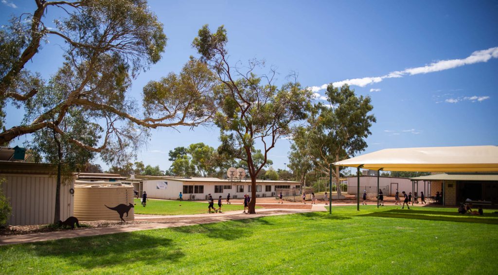 Students walking on the grounds of Leinster Community School